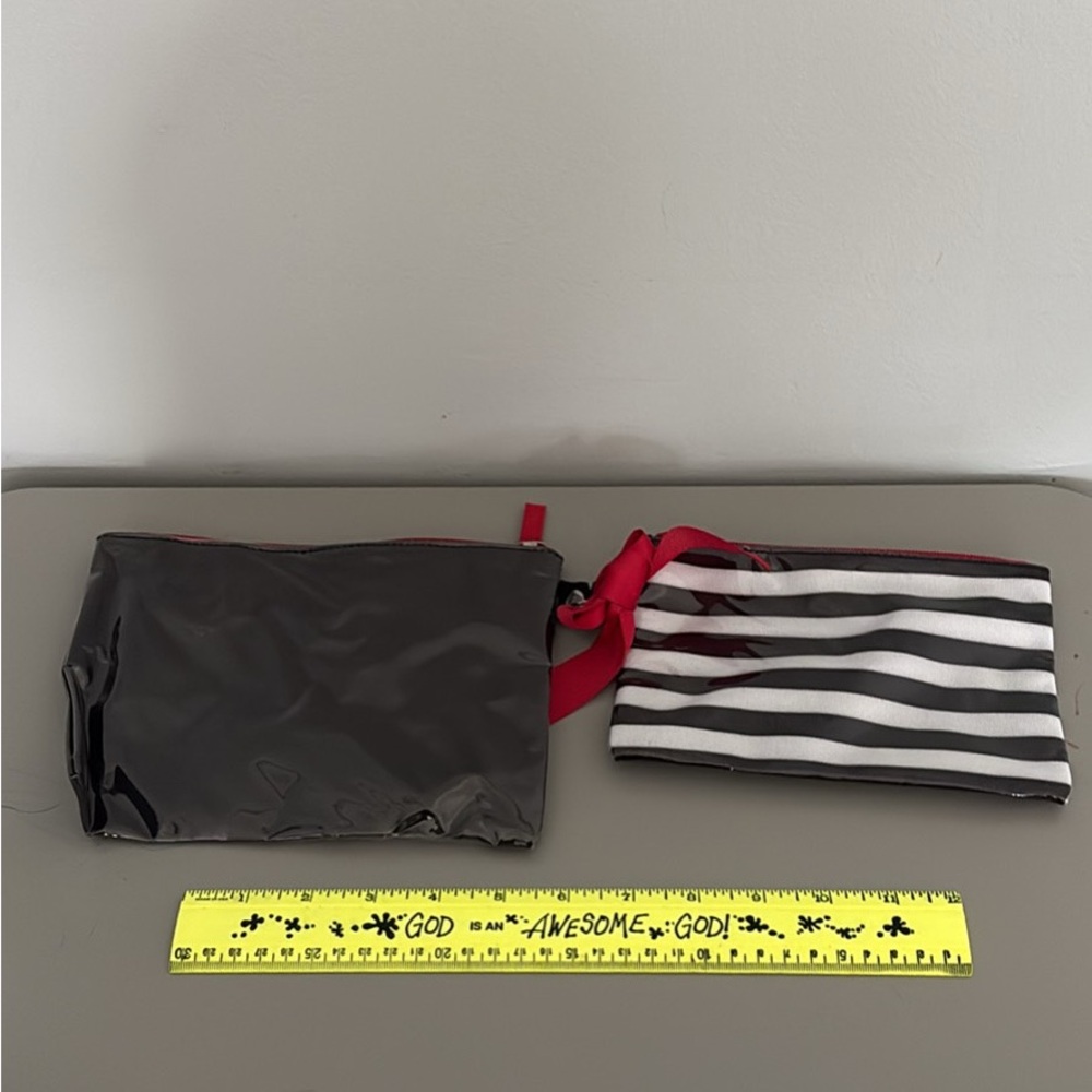 Black and Striped Pouch Set with Red Accents